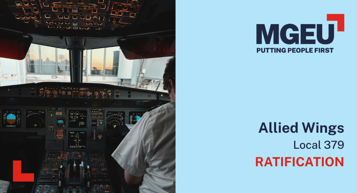 A pilot sits inside a cockpit.